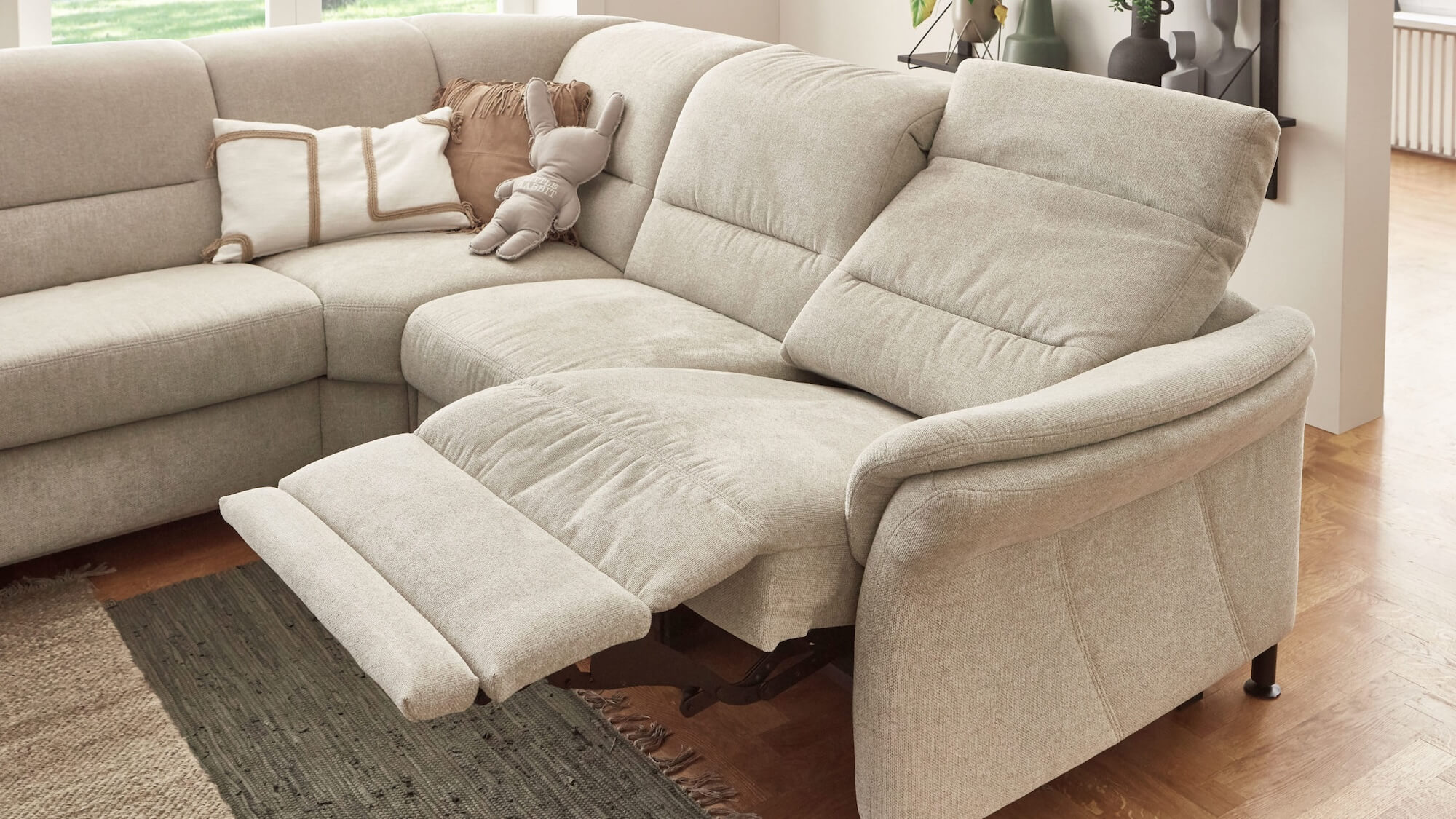 Modulmaster Wohnlandschaft in Stoff creme mit Relaxfunktionen